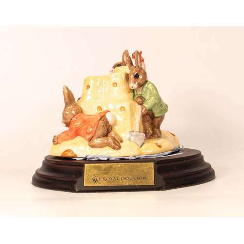 526 - Royal Doulton Bunnykins tableau money bank Sandcastle DB228.( one ear detached but present)