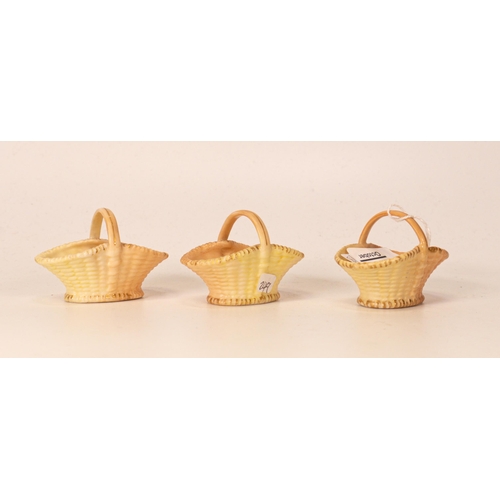 527 - Three Royal Worcester Blush Ivory Miniature Posy Baskets, length 6cm(3)