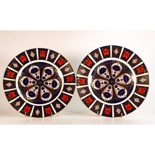 418 - Two Royal Crown Derby dinner plates. Pattern 1128, Old Imari 27cm diameter. Both seconds in quality