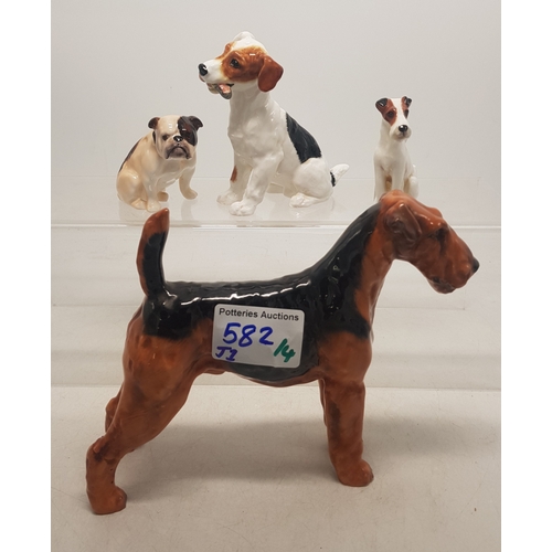 582 - Royal Doulton dog figures to include Airedale HN1023 together with Royal Doulton character Dog, K-se... 