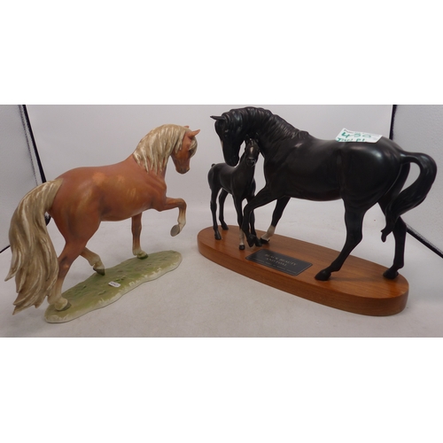 450 - Beswick Black beauty and foal on wooden plinth together with Goebel Horse Figure (2)