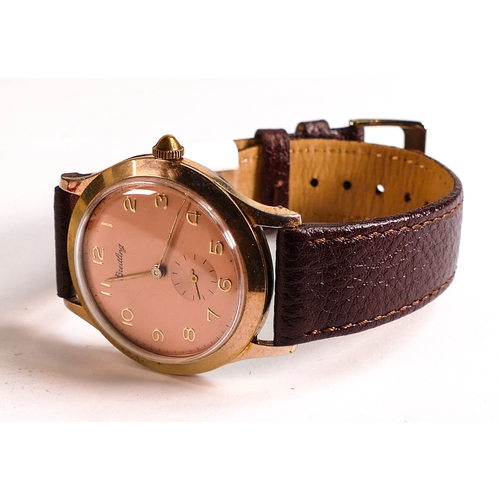 839 - 1960s Breitling gentleman's watch, salmon pink dial, d.38mm, with unworn brown leather strap.