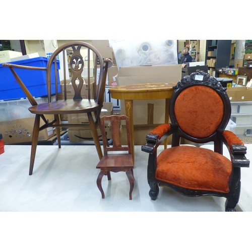 681 - A collection of furniture items including wheelback dining chair, childs armchair, inlaid musical ta... 