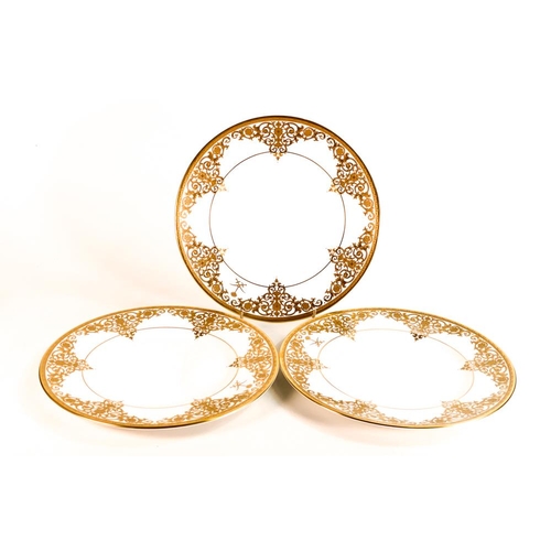 130 - Three De Lamerie Fine Bone China heavily gilded Exotic Scroll patterned cabinet plates , specially m... 