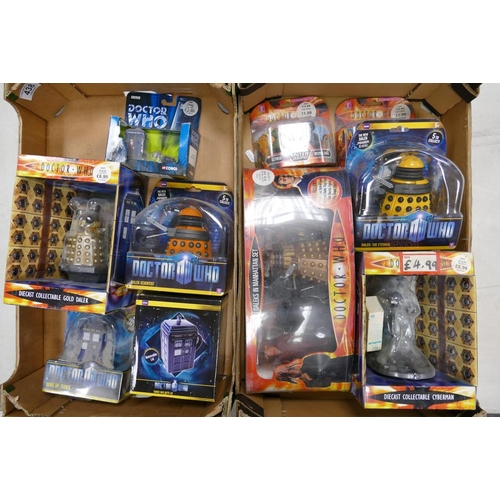 438 - A collection of carded & boxed Dr Who theme Action Figures & sets including Diecast Collectable Gold... 