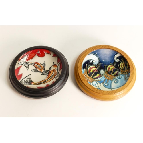 59 - Two Moorcroft framed pin dishes in the Koi carp pattern and the other decorated with pirate boats. D... 