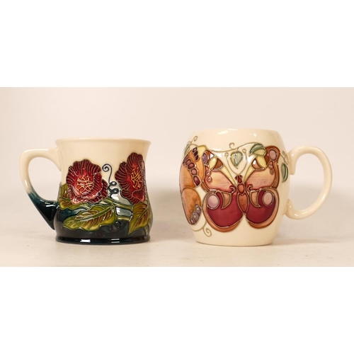 63 - Moorcroft Butterflies mug together with floral mug dated 2000. (2)