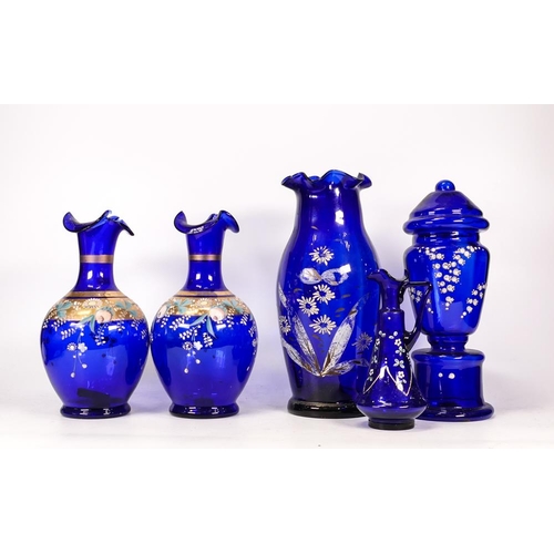 122 - Five Victorian Cobalt Blue Glass items to include Vases, Jug and Pedestal Urn. Damage to gilt exampl... 