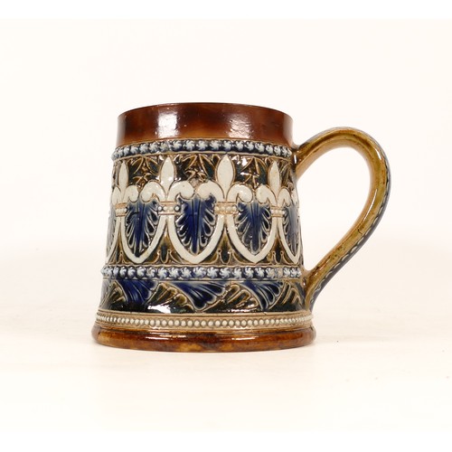 229 - Doulton Lambeth Stoneware Mug. Base is inscribed E.S and RB and 1876. Height: 12cm