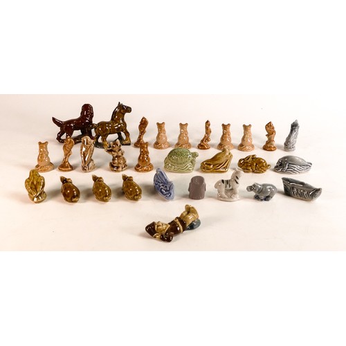 37 - Wade collection of Whimsies Animals including dogs, horses, birds etc. This lot was removed from the... 