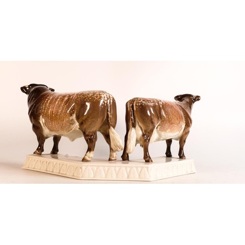 90 - Beswick Dairy Shorthorn bull and cow mounted on ceramic base 1863. 'Presented by Dairy Farmer magazi... 