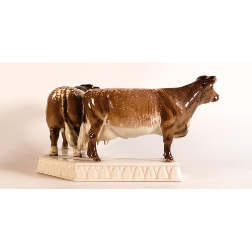 90 - Beswick Dairy Shorthorn bull and cow mounted on ceramic base 1863. 'Presented by Dairy Farmer magazi... 