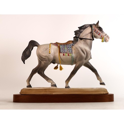 131 - Beswick Arab horse stallion with saddle 2269, with wooden plinth.