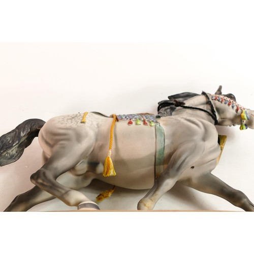 131 - Beswick Arab horse stallion with saddle 2269, with wooden plinth.