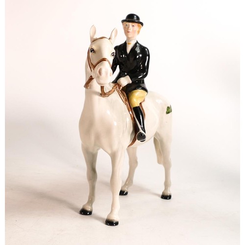 139 - Beswick rare model of Huntswoman on painted white horse, model 1730.