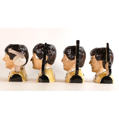 158 - Peggy Davies set of 4 pop legend Beatle character jugs, limited edition of 500. John 85, Paul 84, Ge... 