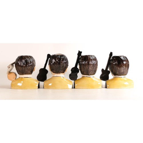 158 - Peggy Davies set of 4 pop legend Beatle character jugs, limited edition of 500. John 85, Paul 84, Ge... 