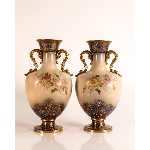 175 - Carlton ware Ivory Blushware twin handled Baluster vases in the Arvista pattern with Cobalt blue gro... 