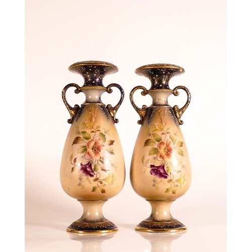 177 - Carlton ware Ivory Blushware twin handled Baluster vases in the Hibiscus pattern with relief moulded... 