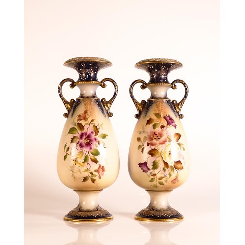 178 - Carlton ware Ivory Blushware twin handled Baluster vases in the Hibiscus pattern with relief moulded... 