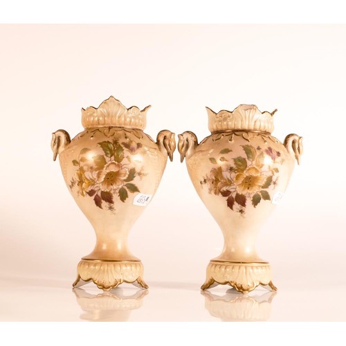 179 - Carlton ware Ivory Blushware swan handled Baluster vases in a hand painted Hibiscus pattern with rel... 