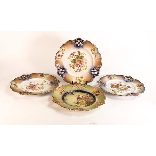 182 - Four Carlton ware Ivory Blushware reticulated plates in the Cornucopia, Rose & Curlicue, and Nasturt... 