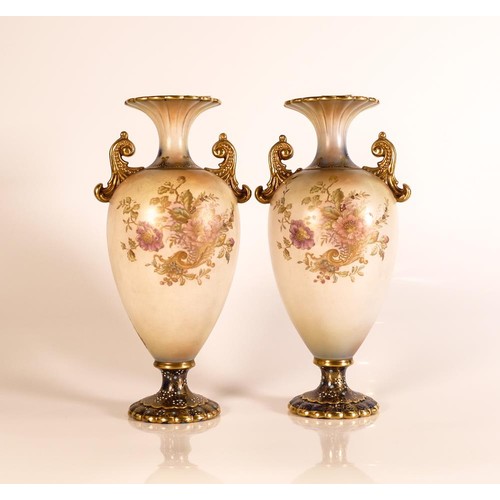 195 - Carlton ware Wiltshaw & Robinson twin handled Baluster vases in the Rose & Curlicue pattern. Decorat... 