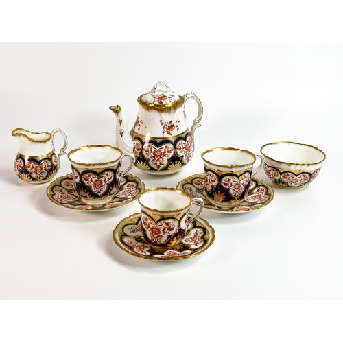 775 - Wileman & Foley part tea for two set. Pattern 7019 to include tea pot, 2 cups & saucers, cream jug, ... 