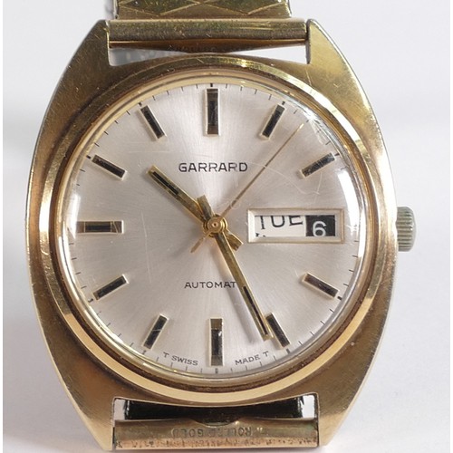 2063 - Garrard 9ct hallmarked gold Automatic gentlemans day/date wristwatch, c1970s, inscription to rear of... 