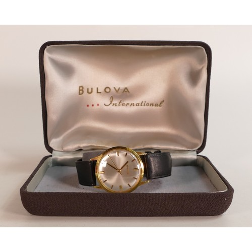 2064 - Bulova 18ct gold gentleman's mechanical wristwatch with leather strap, in original box, c1970s. Good... 