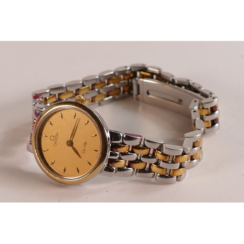 2065 - Ladies Omega de Ville wristwatch, stainless steel  with two colour bracelet, purchase receipt from F... 