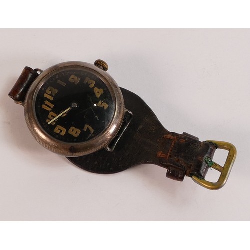 2068 - World War I WWI trench watch, black dial, the case appears to be silver but back too tight to remove... 