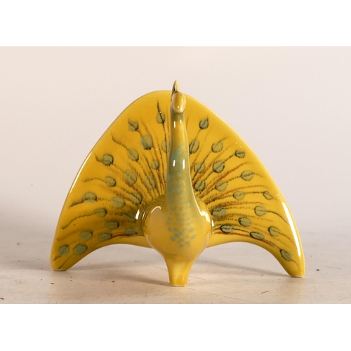 102 - Colin Melbourne for Beswick, a model of a Peacock in unusual yellow & green colours, h.9cm.