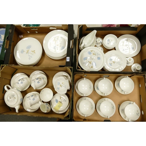 53 - A large collection of Wedgwood Ice Rose Patterned Tea & Dinnerware including two Handled cups & sauc... 