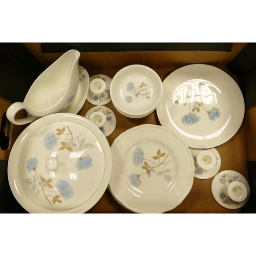 53 - A large collection of Wedgwood Ice Rose Patterned Tea & Dinnerware including two Handled cups & sauc... 