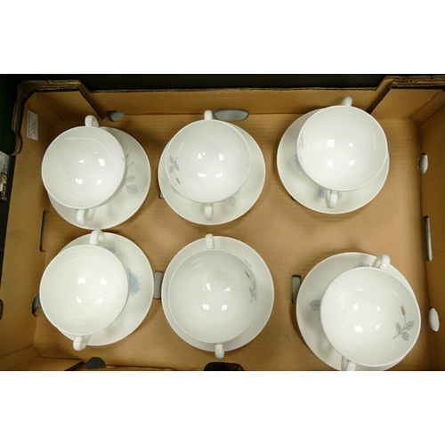 53 - A large collection of Wedgwood Ice Rose Patterned Tea & Dinnerware including two Handled cups & sauc... 