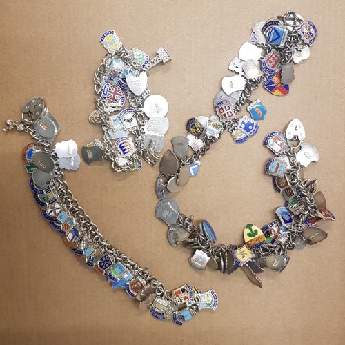 607 - 4 Sterling Silver charm bracelets each with silver & Enamel charms (Total weight 287.2g)