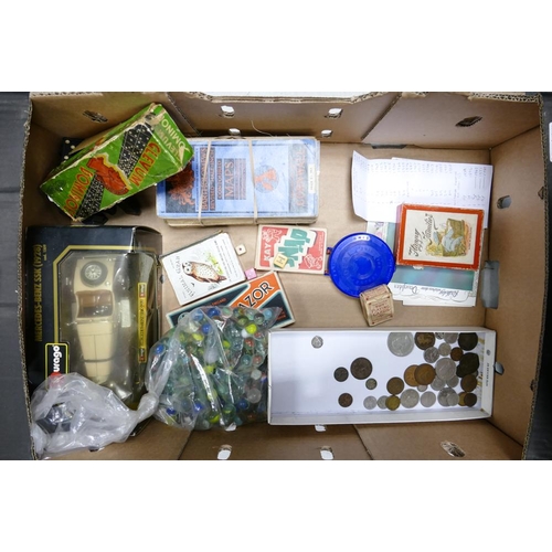 43 - A mixed collection of items to include vintage toys, Boxed Burago Merc SSk , Marbles, vintage coins ... 