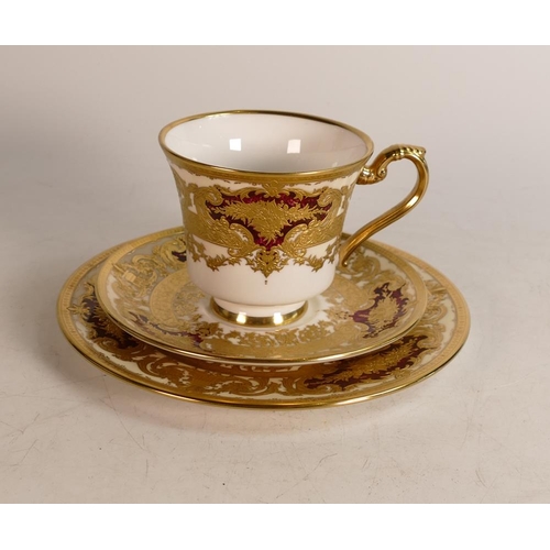 60 - De Lamerie Fine Bone China heavily gilded Burgundy Majestic Pattern Trio, specially made high end qu... 