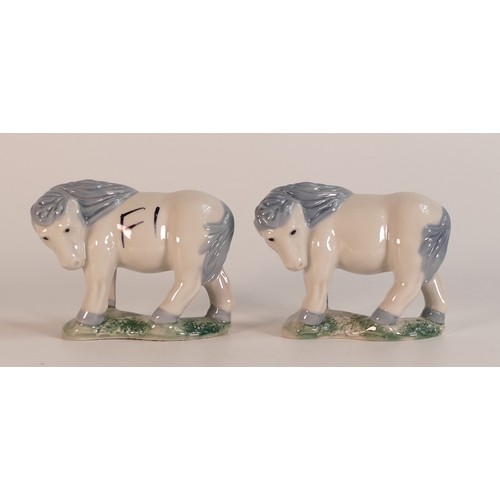 11 - Two Wade Shetland pony figures, one marked F1, initials to base and dated 24/11/04. Height 7cm. This... 