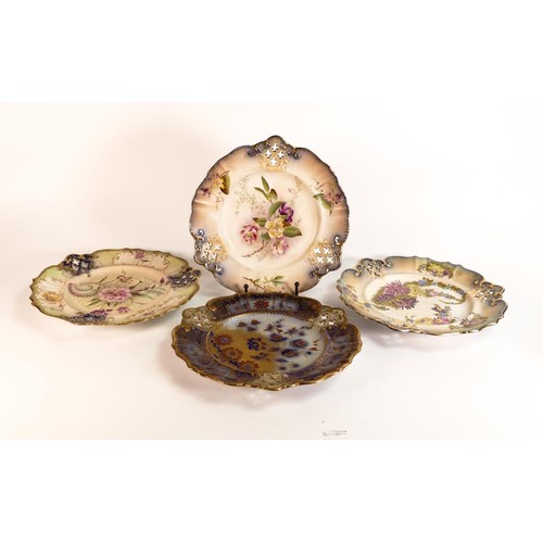 24 - Four Carlton ware Ivory Blushware reticulated plates in the Camelia, Regalia, Carnation and Floral p... 