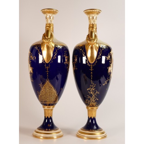 52 - 19th century Coalport pair of two handled vases, gilded all over & decorated with panels of Windsor ... 