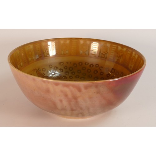 64 - Jonathan Cox Ceramics vibrantly decorated fruit bowl with lustre peacock decoration, diameter 25.5cm