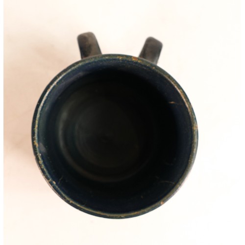 66 - Dicker Ware Sussex two handed tankard, in deep blue mat glaze, hairline to rim & various paint chips... 