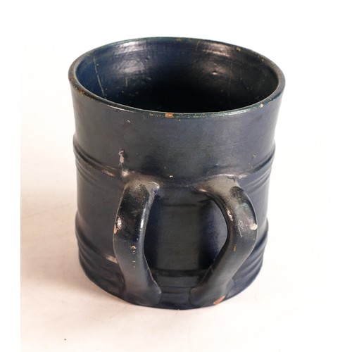 66 - Dicker Ware Sussex two handed tankard, in deep blue mat glaze, hairline to rim & various paint chips... 