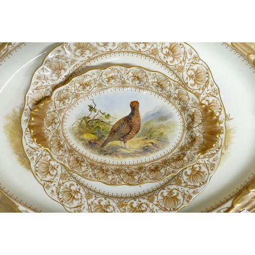 89 - A Royal Worcester 'Game & Sea Birds' part dinner service, dated 1889, pattern 3425, comprising a dee... 