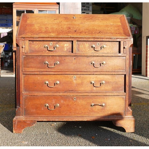 308 - Georgian light Oak bureau, five draws, canted corners and fitted interior, w.96 x d.47 x h.101cm.