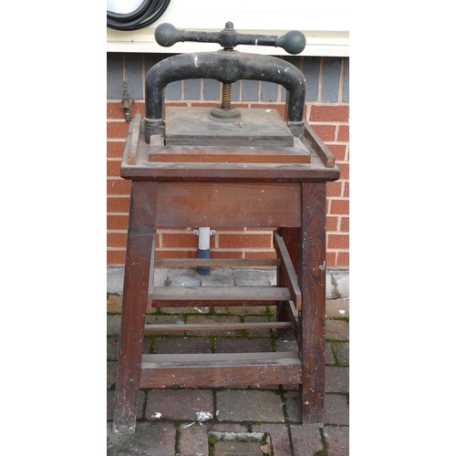 311 - 19th century large cast Iron book press on primitive pine base, height 106cm, width 50cm & depth 39c... 