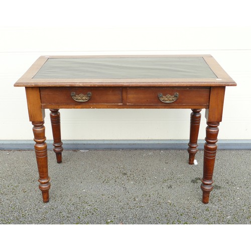 316 - Victorian leather topped writing desk on turned supports. Inset black leather top. Two drawers to fr... 