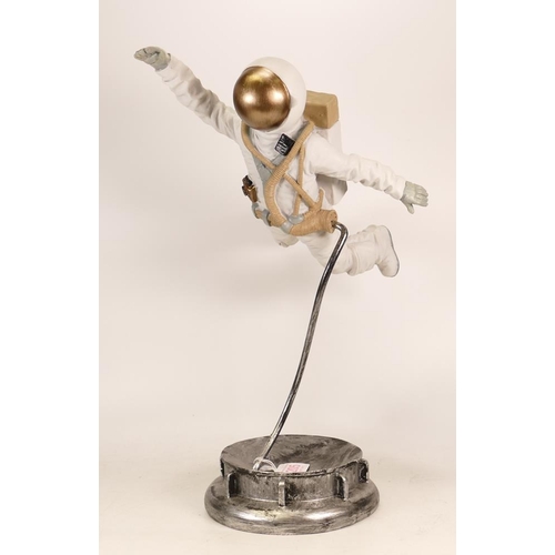 205 - Sc-fi unmarked figure of astronaut flying through space, chip at base, height 46cm